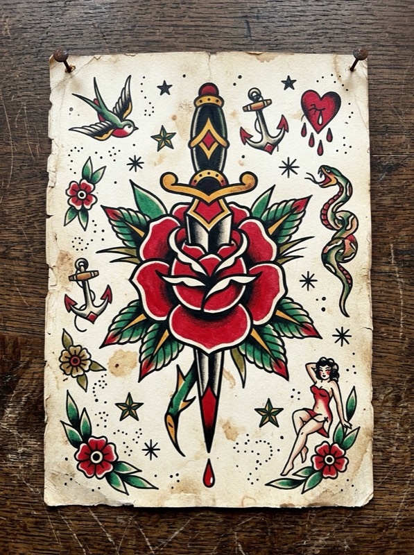 Traditional dagger wrapped in a blooming rose, drawn in bold black lines.