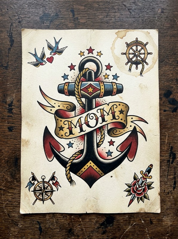 Traditional anchor with banner ribbon tattoo