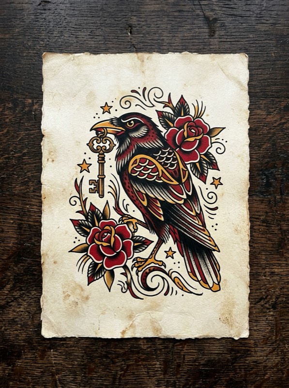 Neo-traditional crow holding an old brass key, small wrist scale.